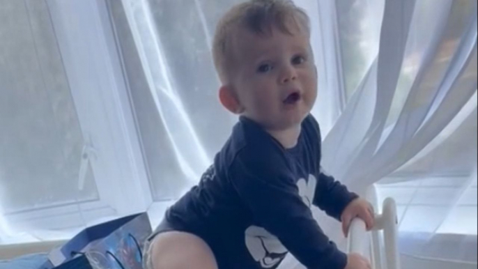 Go-getter baby boy puts Spy Kids to shame with his window board climbing adventure