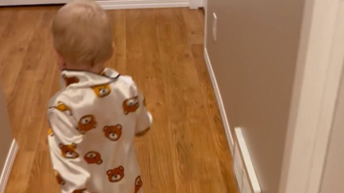 Little toddler excitedly runs to her bed for a good night's sleep *Wholesome*