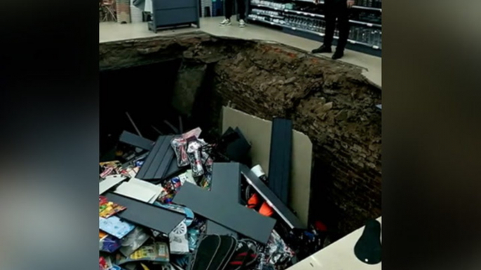 Huge hole opens after floor collapses in newly-opened Chinese supermarket