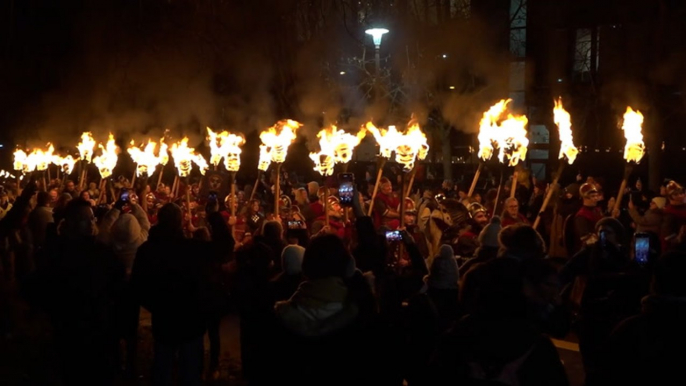 Thousands of torches light up Edinburgh streets kicking off Hogmanay celebrations