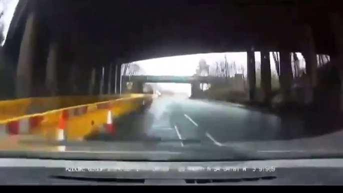 Woman almost gets hit, as wrecking ball crashes through her car's windshield