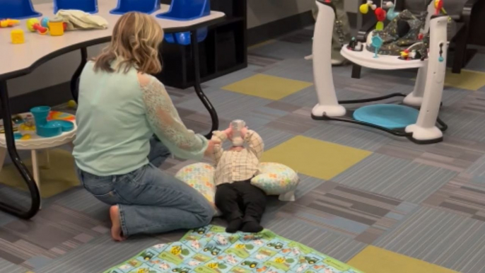 Dramatic baby boy goes from chilling to crying after mom comes to pick him up from nursery