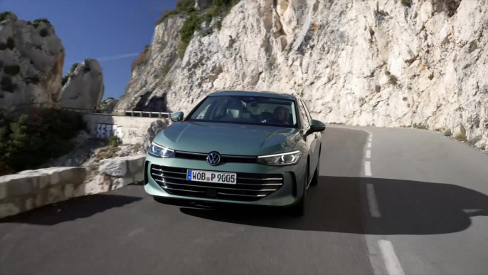 Volkswagen Passat in Mariposit Green Metallic Driving Video