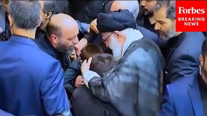 Ayatollah Khamenei Kisses Grandsons Of Iranian President Ebrahim Raisi At Funeral In Tehran, Iran