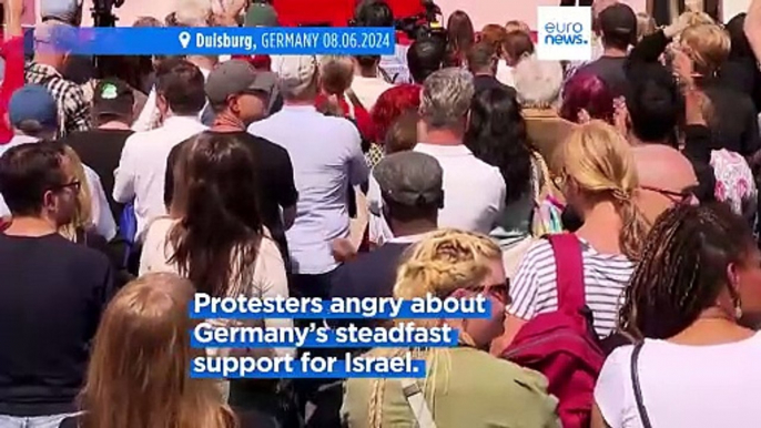 German chancellor Olaf Scholz heckled by pro-Palestinian protesters at SPD rally