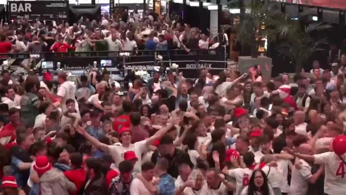 Pints fly through air as England fans celebrate late Bellingham equaliser