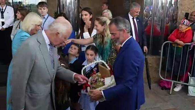 King and Queen brave torrential rain to enjoy Jersey parade