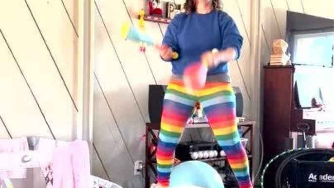 Circus Artist Does Multiple Tricks to Entertain Her Baby Daughter