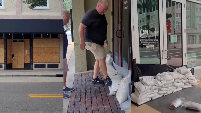 Businesses boarding up their windows and putting sandbags outside as Hurricane Milton approaches Florida