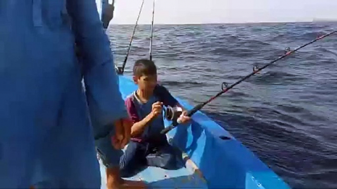 LITTLE ANGLER CAUGHT FISH  BARRACUDA/CHARNA ISLAND